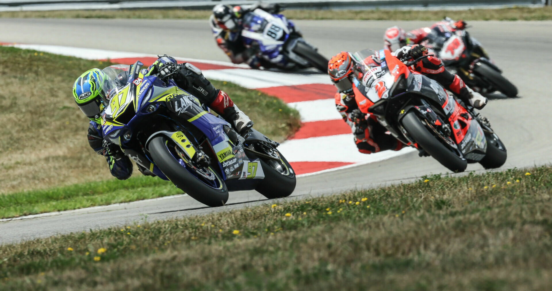 Rocco Landers (97) won his third straight Supersport race, topping Josh Herrin (2) and Tyler Scott (70 on Saturday at PittRace. Photo by Brian J. Nelson, courtesy MotoAmerica.