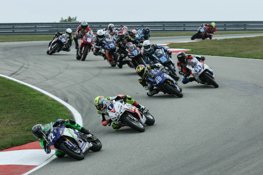 Blake Davis (22) finished second in the REV'IT! Twins Cup race on Sunday to move into the championship points lead. The race was won by Cory Ventura (28). Photo by Brian J. Nelson, courtesy MotoAmerica.