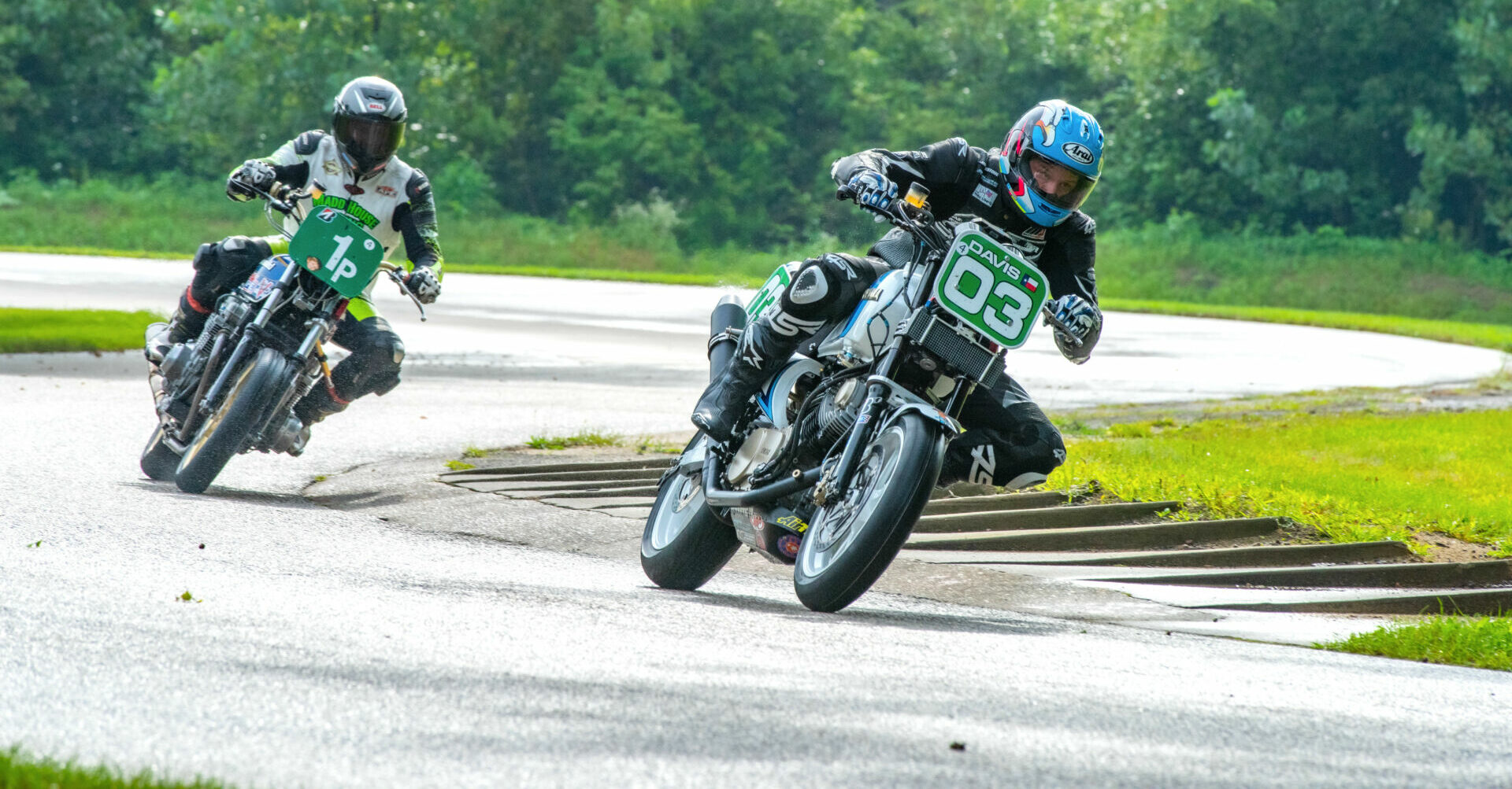 Jesse Davis (03) leads Jeremy Maddrill (1P) during AHRMA Vintage Cup Race One at Blackhawk Farms Raceway. Photo by Kevin McIntosh, courtesy AHRMA.