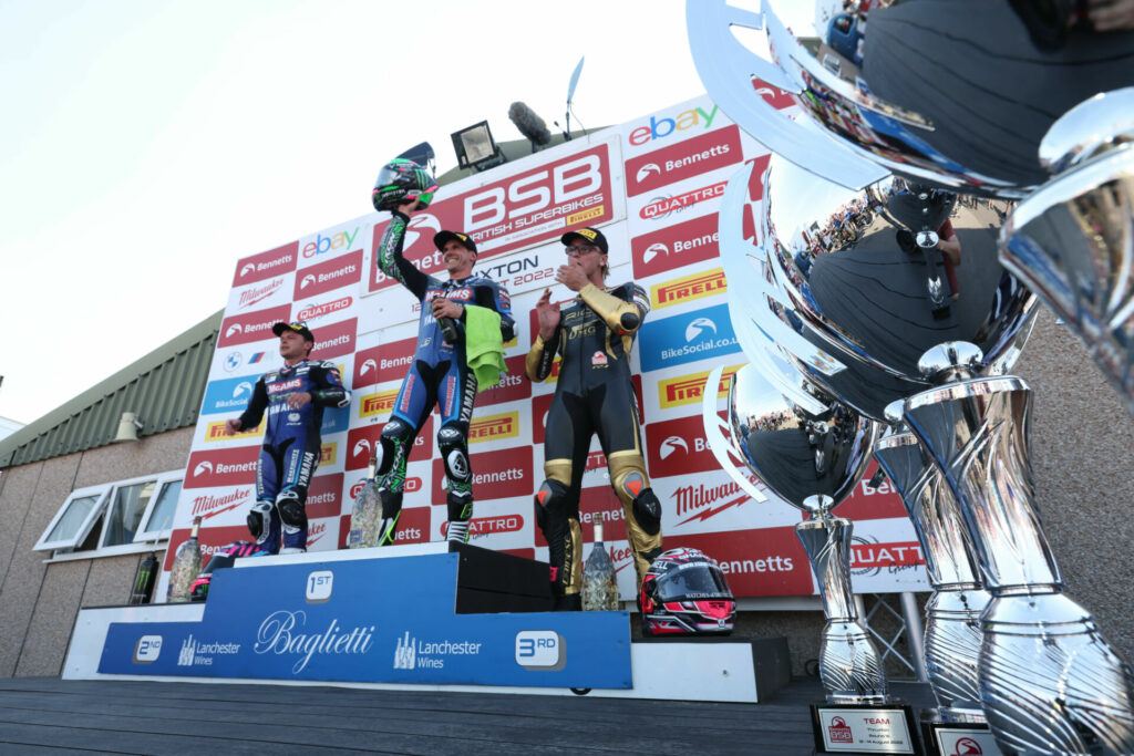 Race One winner Jason O'Halloran (center), runner-up Tarran Mackenzie (left), and Bradley Ray (right) on the podium after Race One at Thruxton. Photo courtesy MSVR.