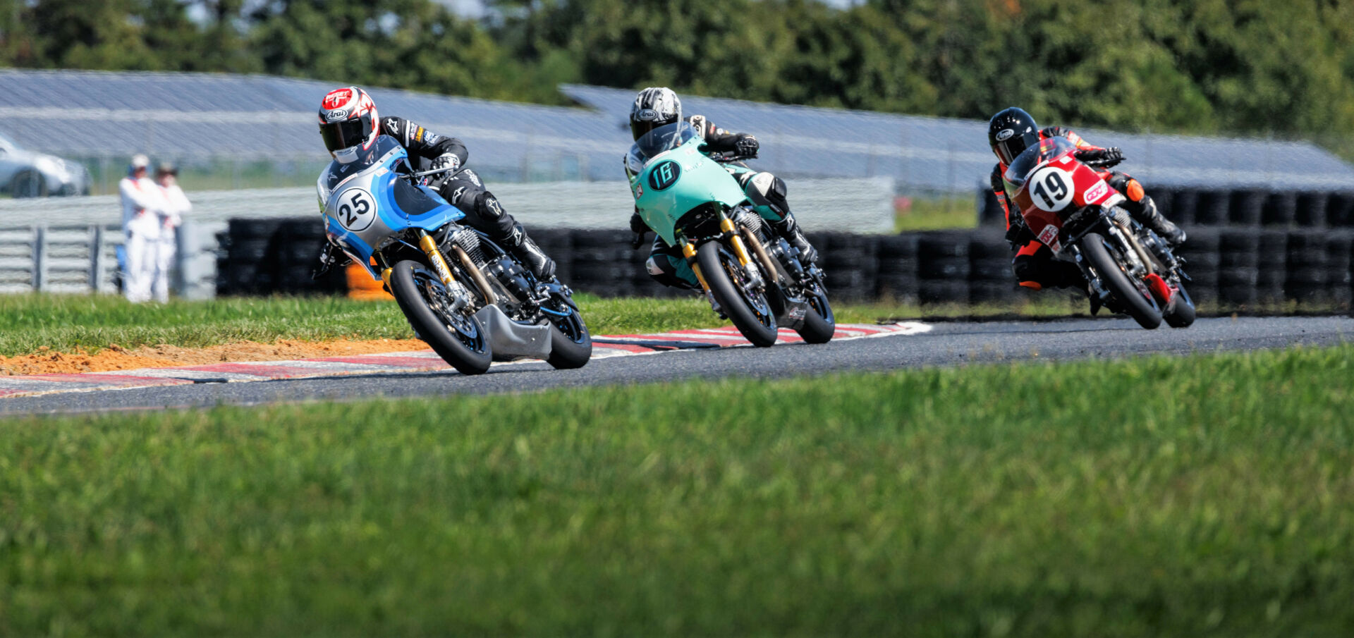 Crystal Martinez (25) leads Kayleigh Buyck (16), and Jennifer Chancellor (19) during the Royal Enfield BTR race at NJMP. Photo courtesy Royal Enfield North America.