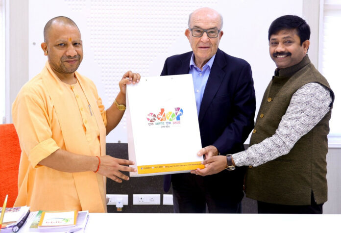 Honorable Chief Minister of Uttar Pradesh Shri Yogi Aditya Nath (left), CEO Dorna Carmelo Ezpeleta (center), and Industrial Development Export & Investment Promotion & NRI Minister Mr. Nand "Nandi" Gopal Gupta. Photo courtesy Dorna.