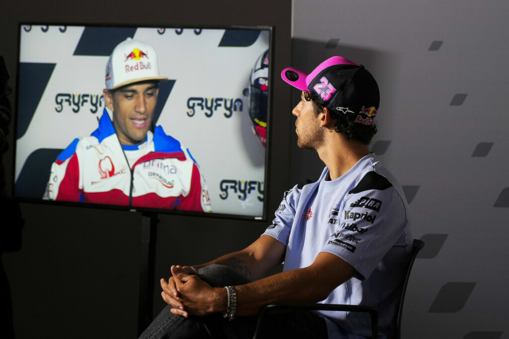 Enea Bastianini (right) watches Jorge Martin on a monitor. Photo courtesy Dorna.