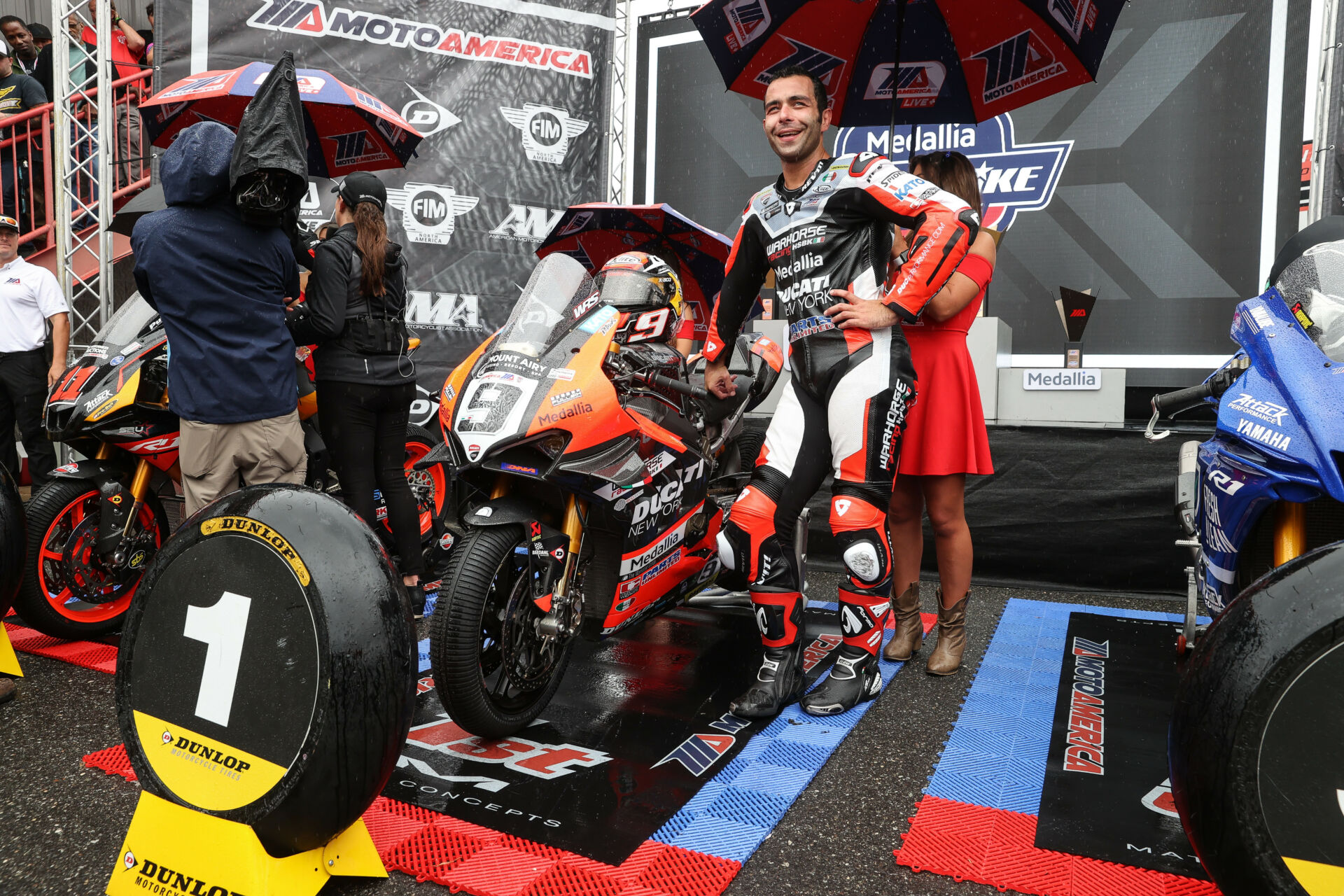 A happy Danilo Petrucci in Victory Circle after winning MotoAmerica Superbike Race Two at New Jersey Motorsports Park. Photo by Brian J. Nelson.