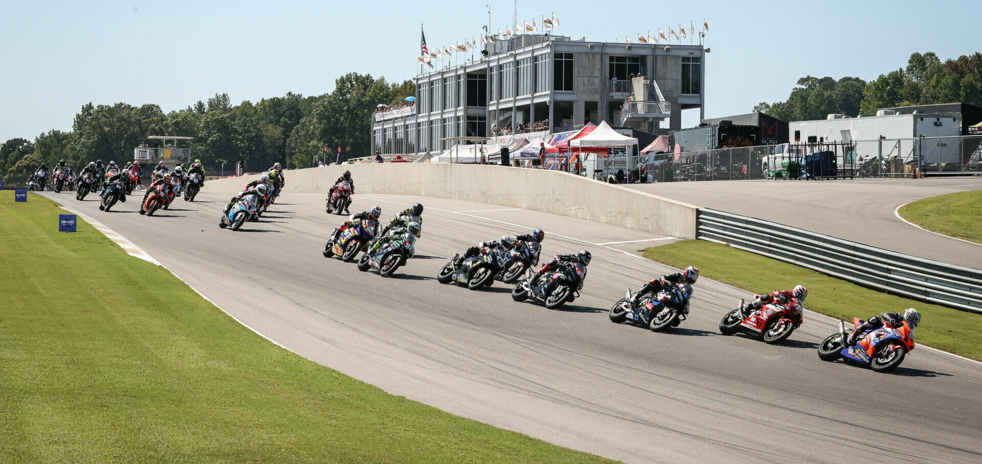 Hayden Gillim (far right) leads the start of the Stock 1000 race at Barber Motorsports Park. Photo by Brian J. Nelson.
