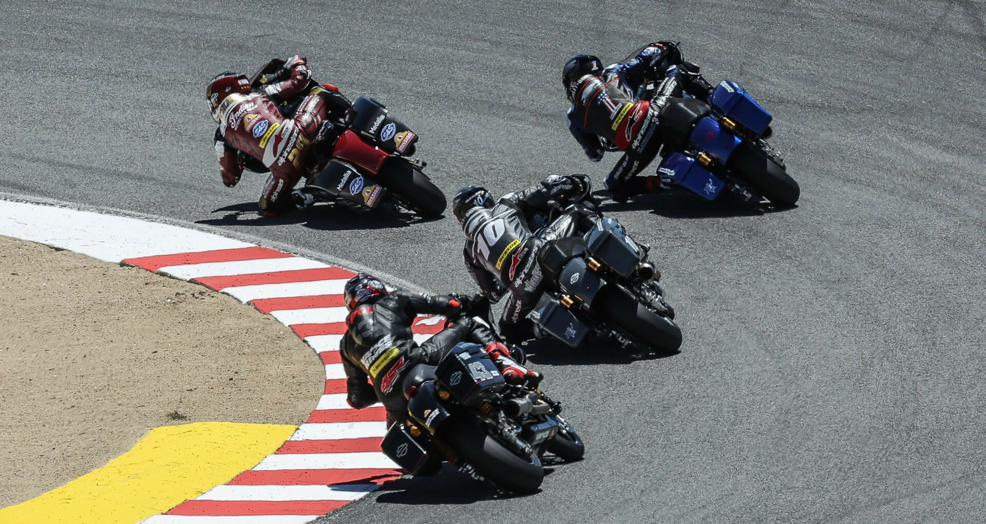 Three points is all that separates Travis Wyman (10) from Tyler O'Hara (leading) in the MotoAmerica Mission King Of The Baggers Championship as the series holds its finale this weekend at New Jersey Motorsports Park. What role will Kyle Wyman (1) play in the outcome? Photo by Brian J. Nelson, courtesy MotoAmerica.