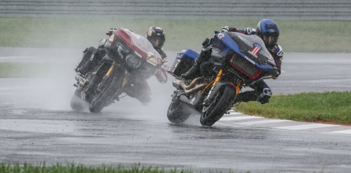 Kyle Wyman (1) and Tyler O'Hara (29) fight for the lead in the wet King Of The Baggers race. Photo by Brian J. Nelson, courtesy Harley-Davidson.