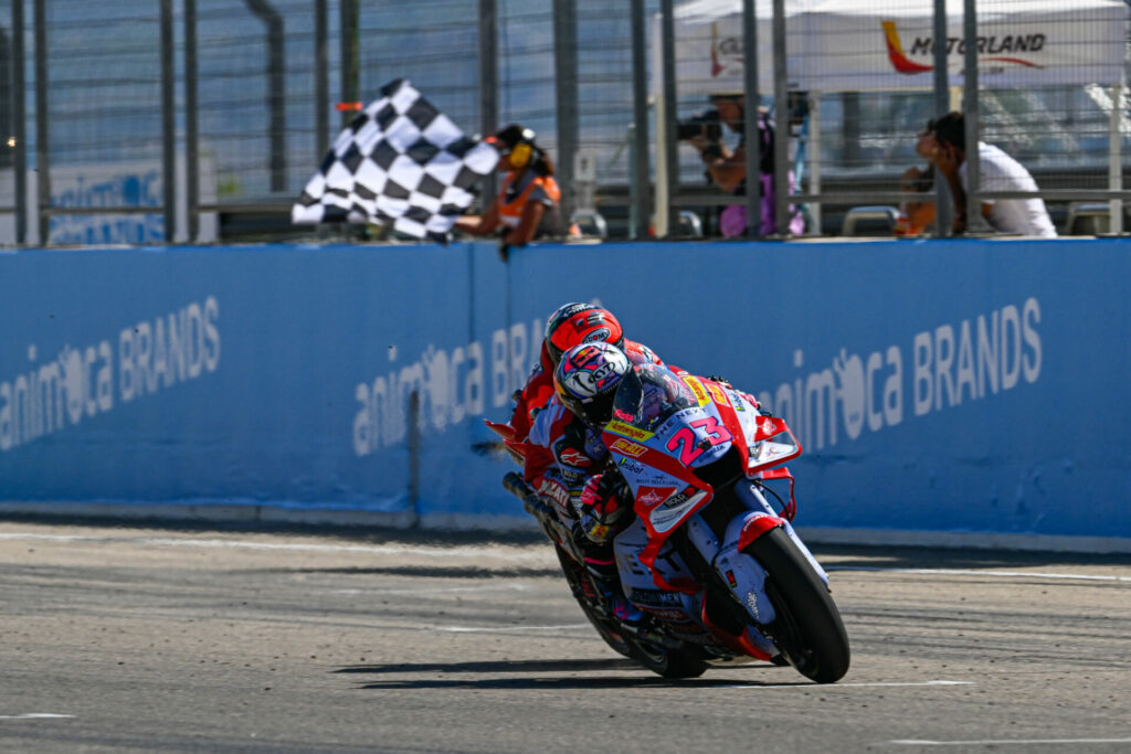 Enea Bastiani (23) narrowly beat Francesco Bagnaia (behind Bastianini) to the finish line. Photo courtesy Dorna.