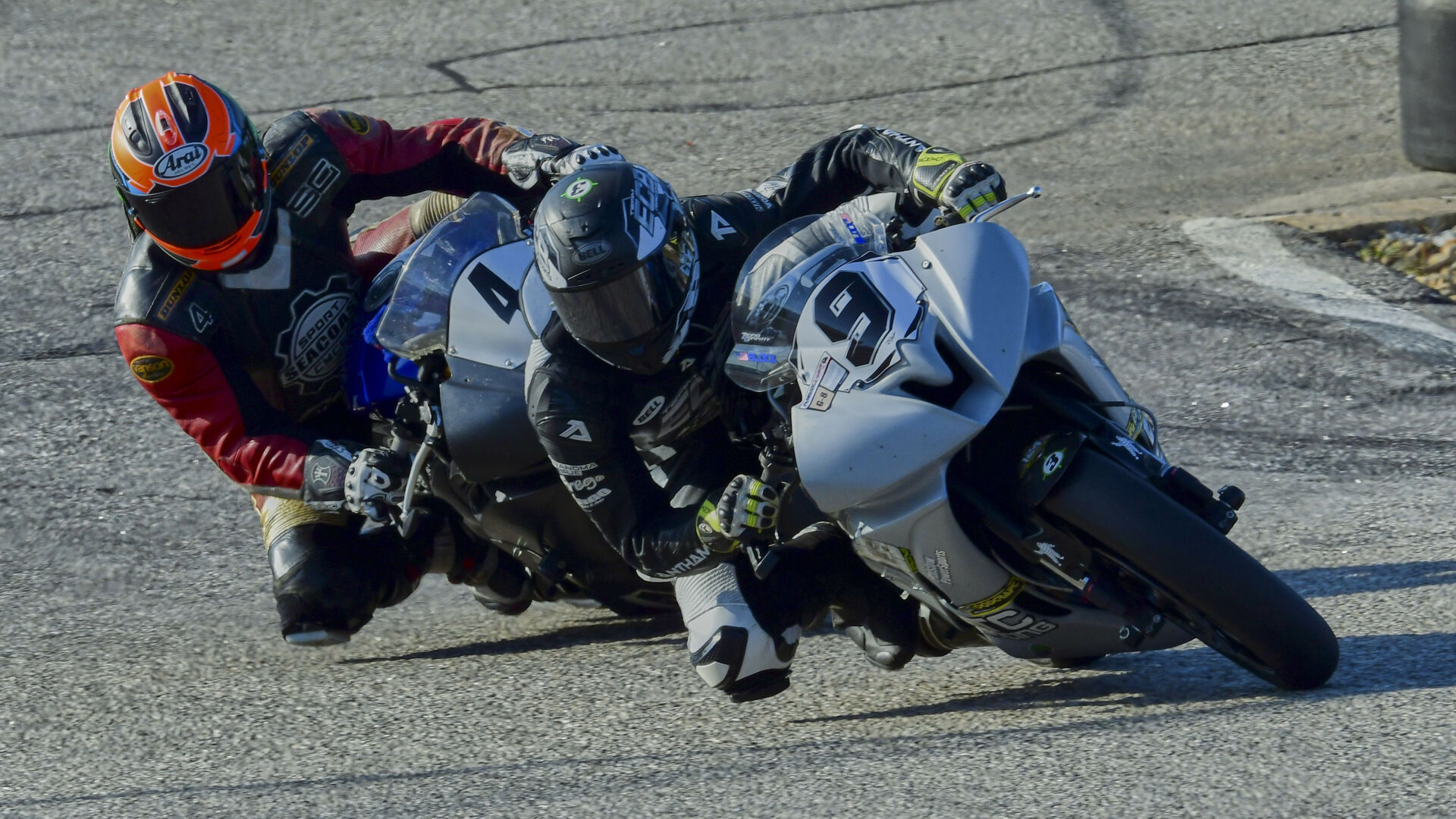 Eli Block (9) leads Scott Greenwood (1) in the Michelin-Motorace Middleweight GP at NHMS. Greenwood won the race, and Block was the runner-up. Photo by Martin Hanlon, courtesy NEMRR.