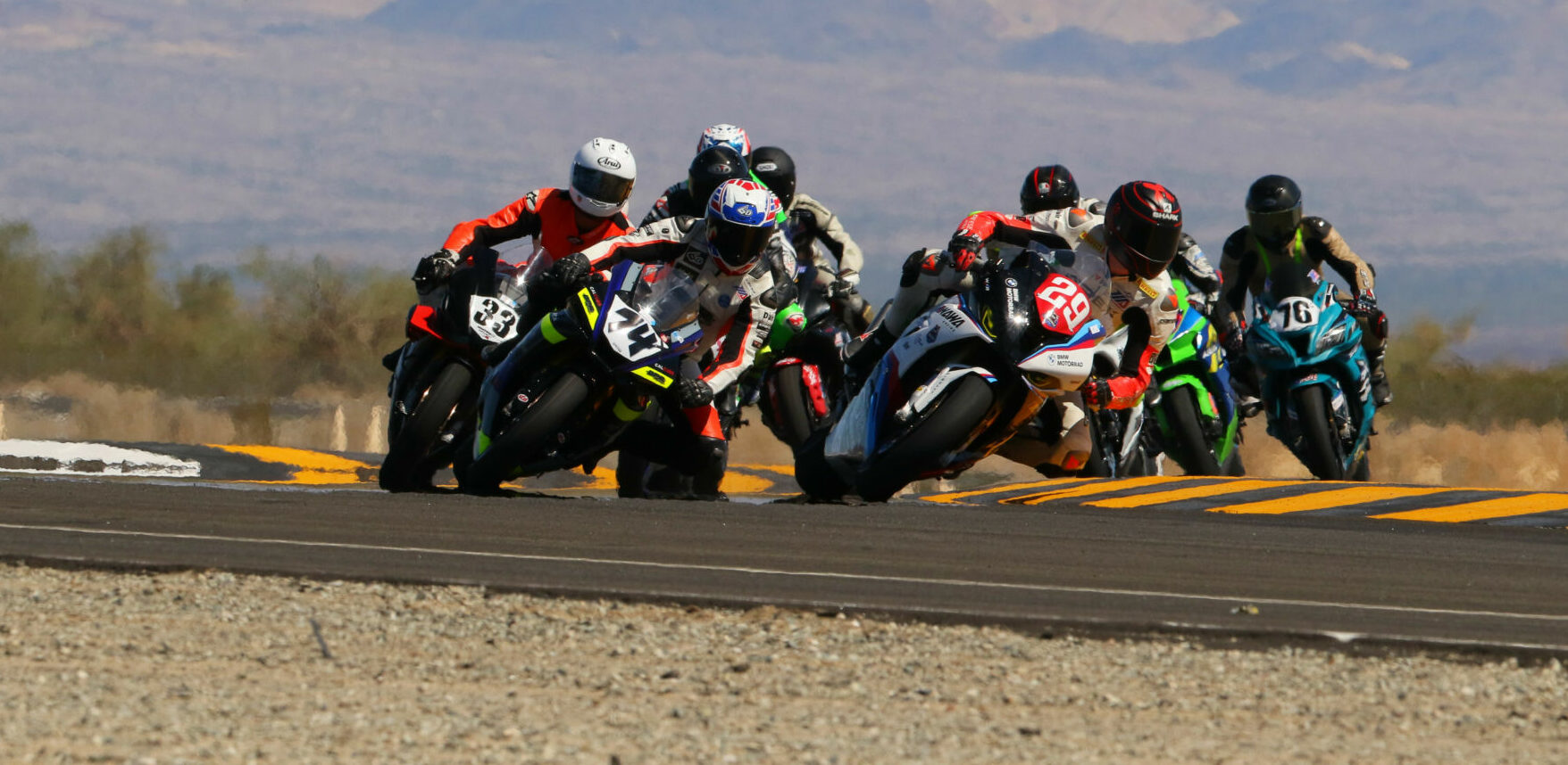 Eventual race winner Jack Bakken (29) leads Bryce Prince (74), Wes Farnsworth (33), and the rest of the field early in the CVMA Stock 1000 Shootout at Chuckwalla Raceway. Photo by CaliPhotography.com, courtesy CVMA.