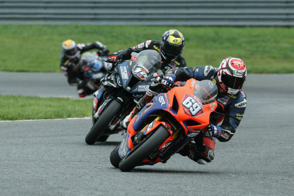 Hayden Gillim (69) held off the advances of Travis Wyman (10) to win the Stock 1000 race. Photo by Brian J. Nelson.