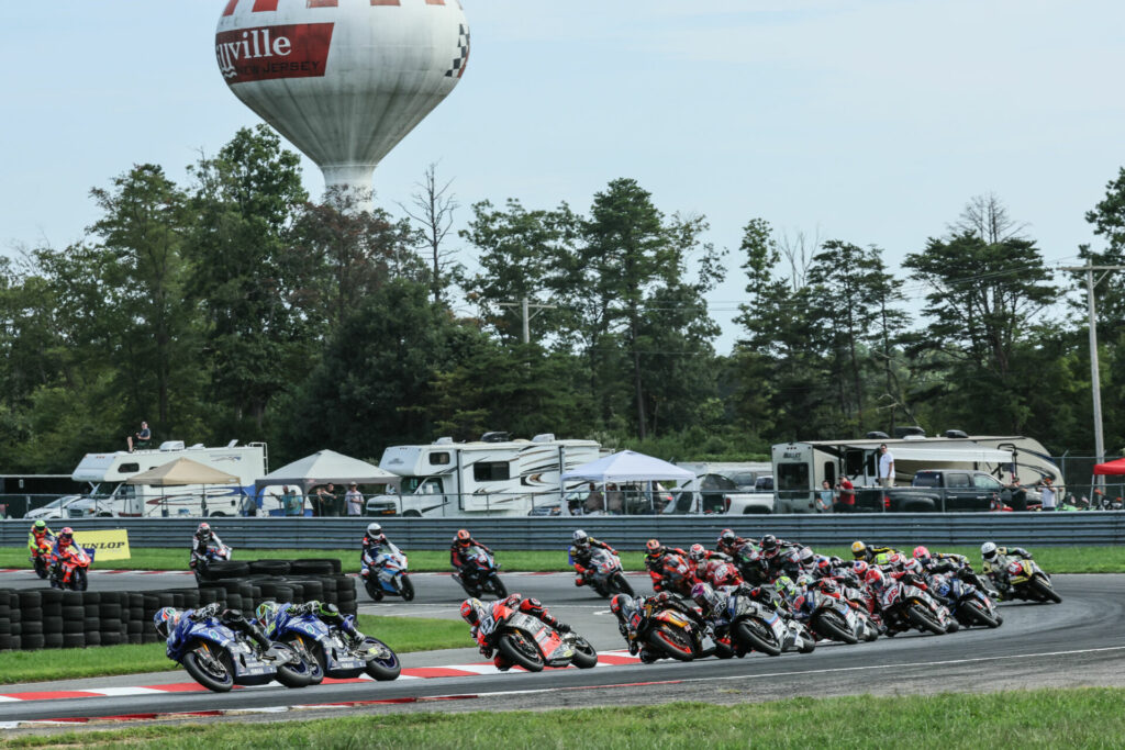 Jake Gagne (1) leads Cameron Petersen (45), Danilo Petrucci (9), Mathew Scholtz (11), and the rest of the field at the start of MotoAmerica Medallia Superbike Race One. Photo by Brian J. Nelson, courtesy MotoAmerica.