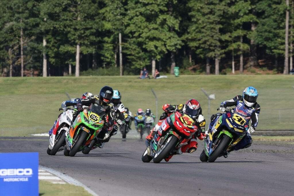 Gus Rodio (96) won the last SportbikeTrackGear.com Junior Cup race after a thrilling battle with Kayla Yaakov (31). Although Rodio tied Cody Wyman (not pictured) in the point standings, Wyman won the title by virtue of the tie-breaker. Photo by Brian J. Nelson, courtesy MotoAmerica.