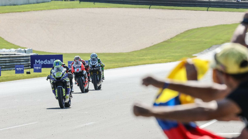 Rocco Landers (97) beats Josh Herrin (2) and Stefano Mesa (37) to the line to win the Supersport race on Saturday at Barber Motorsports Park. Photo by Brian J. Nelson, courtesy MotoAmerica.