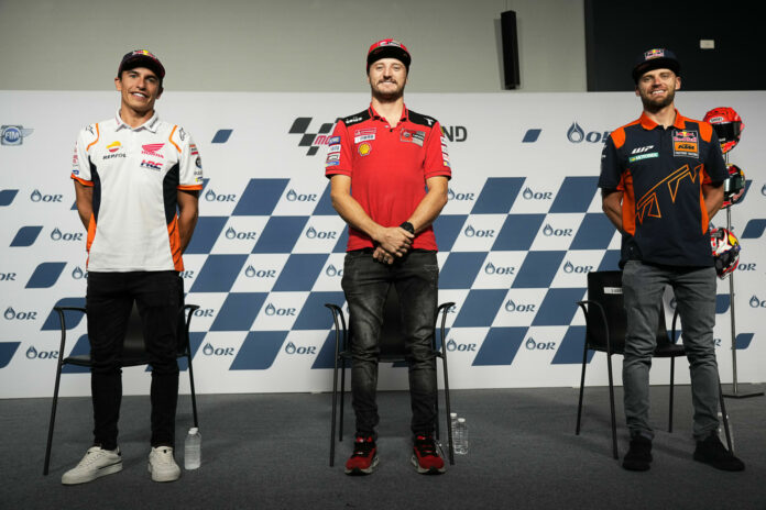 Jack Miller (center), Marc Marquez (left), and Brad Binder (right) during the second half of the pre-event press conference in Thailand. Photo courtesy Dorna.