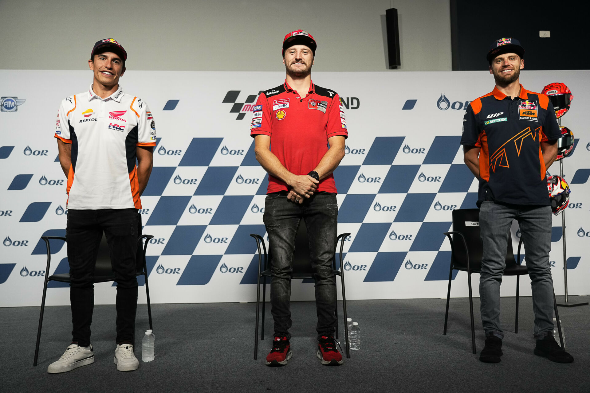 Jack Miller (center), Marc Marquez (left), and Brad Binder (right) during the second half of the pre-event press conference in Thailand. Photo courtesy Dorna.