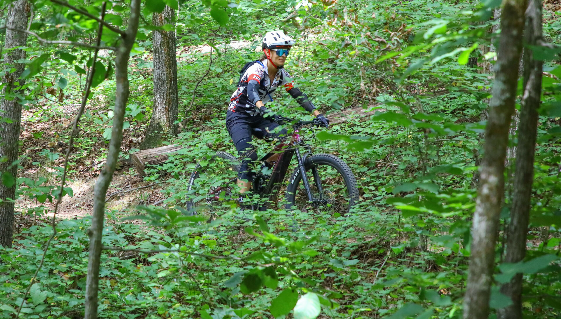 Anne Roberts in action on a Liv Intrigue X E+ 1 electric mountain bike somewhere in Georgia. Photo by Lee Fields.