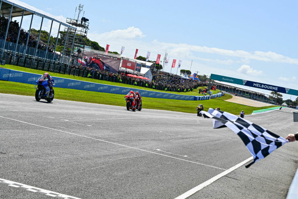 Alex Rins (42) leads Marc Marquez (93), Francesco Bagnaia (63), Marco Bezzecchi (72), and the rest of the MotoGP field to the checkered flag at Phillip Island. Photo courtesy Dorna.