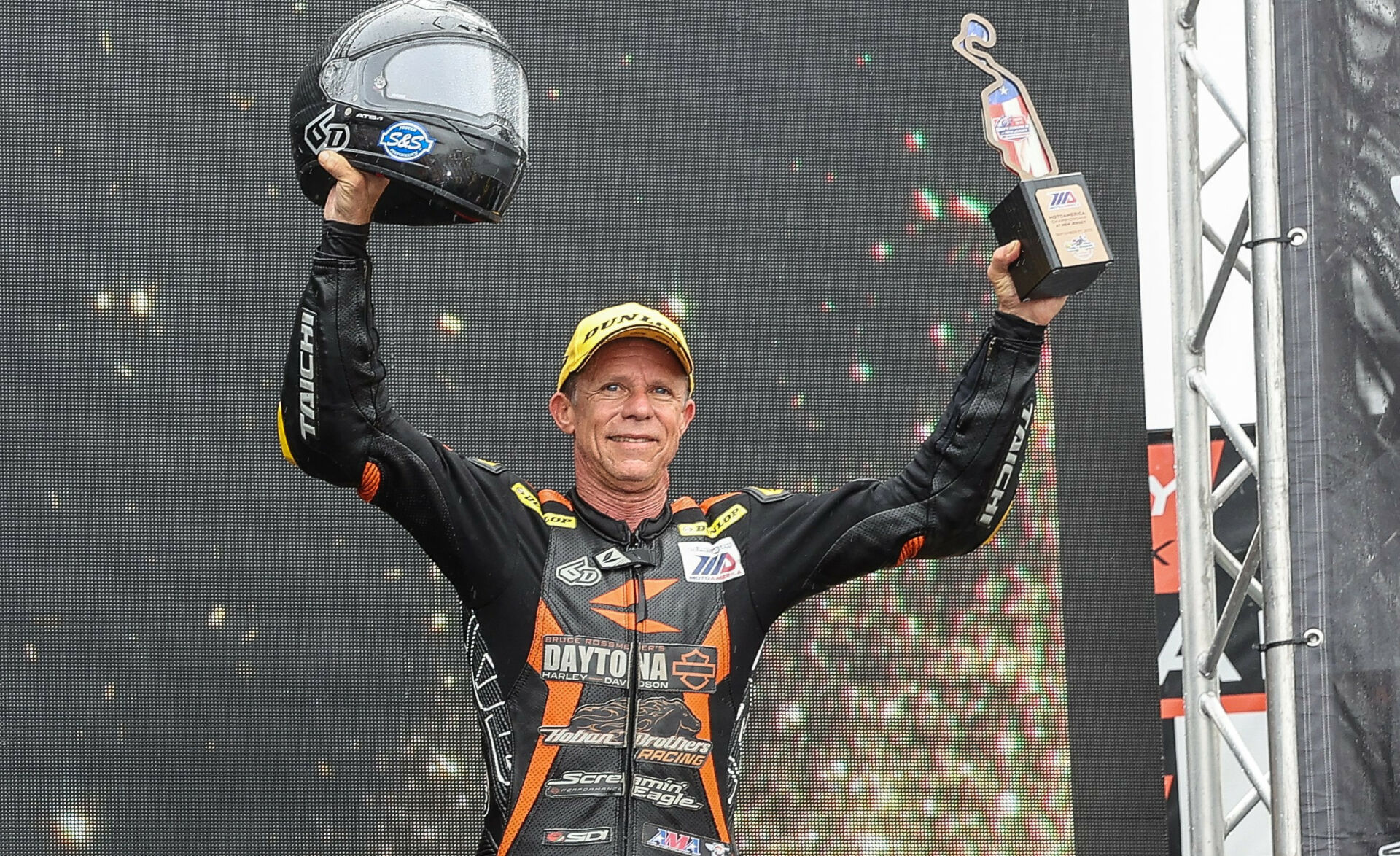 Michael Barnes on the MotoAmerica King Of The Baggers podium at New Jersey Motorsports Park. Photo by Brian J. Nelson.