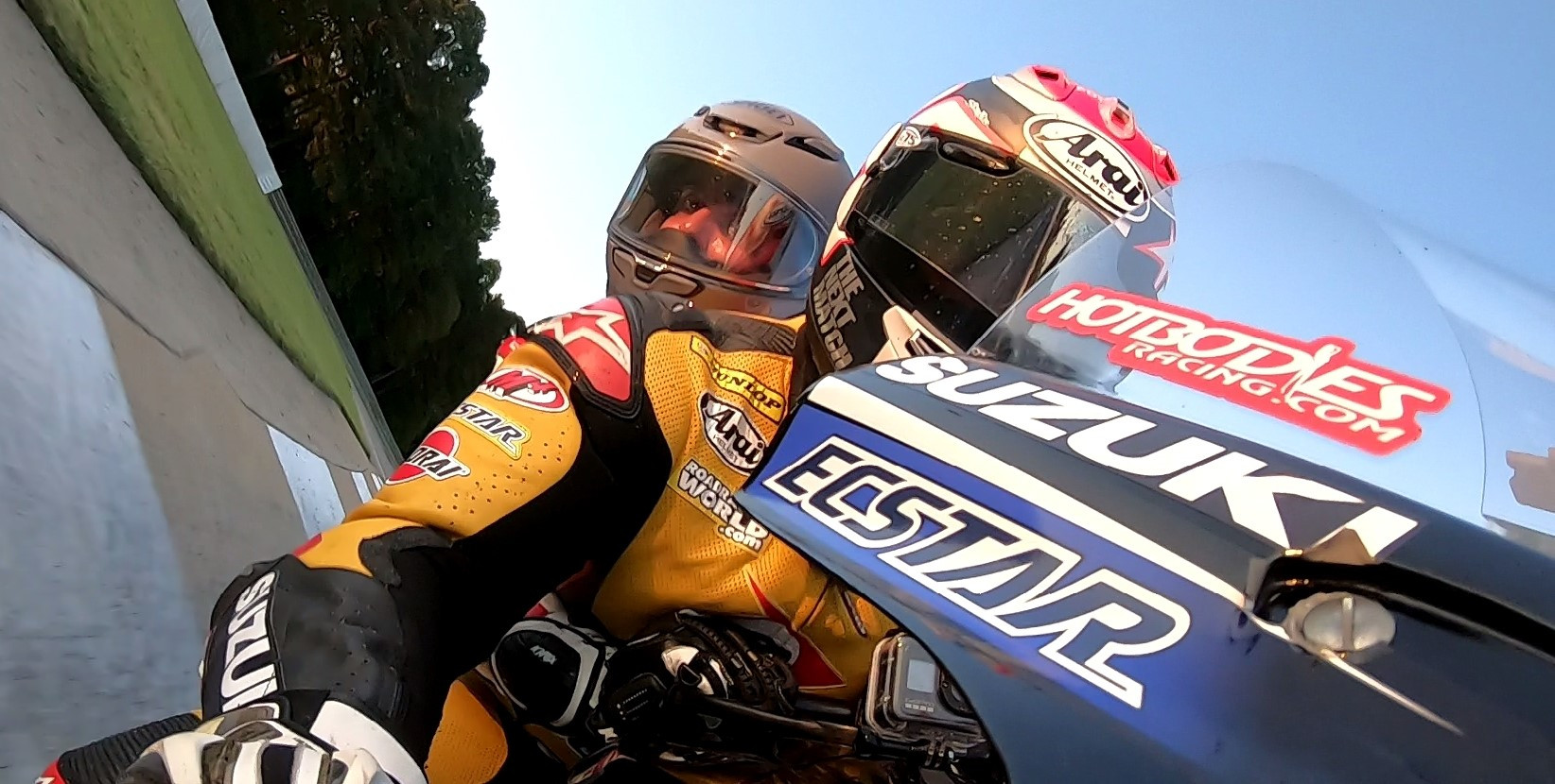 Photo-journalist Joe Jackson during a ride with Chris Ulrich on the Dunlop ECSTAR Suzuki GSX-R1000R two-seat Superbike at Barber Motorsports Park. Photo by David Swarts.