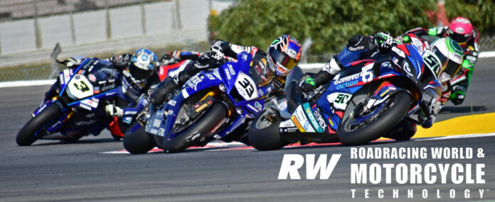 Jake Gagne (33) battled with Eugene Laverty (50) for much of Sunday's Superpole Race, finishing less than 0.1 second back in 16th. He would move up one more place in Race Two, scoring a World Superbike point. Photo by Michael Gougis.