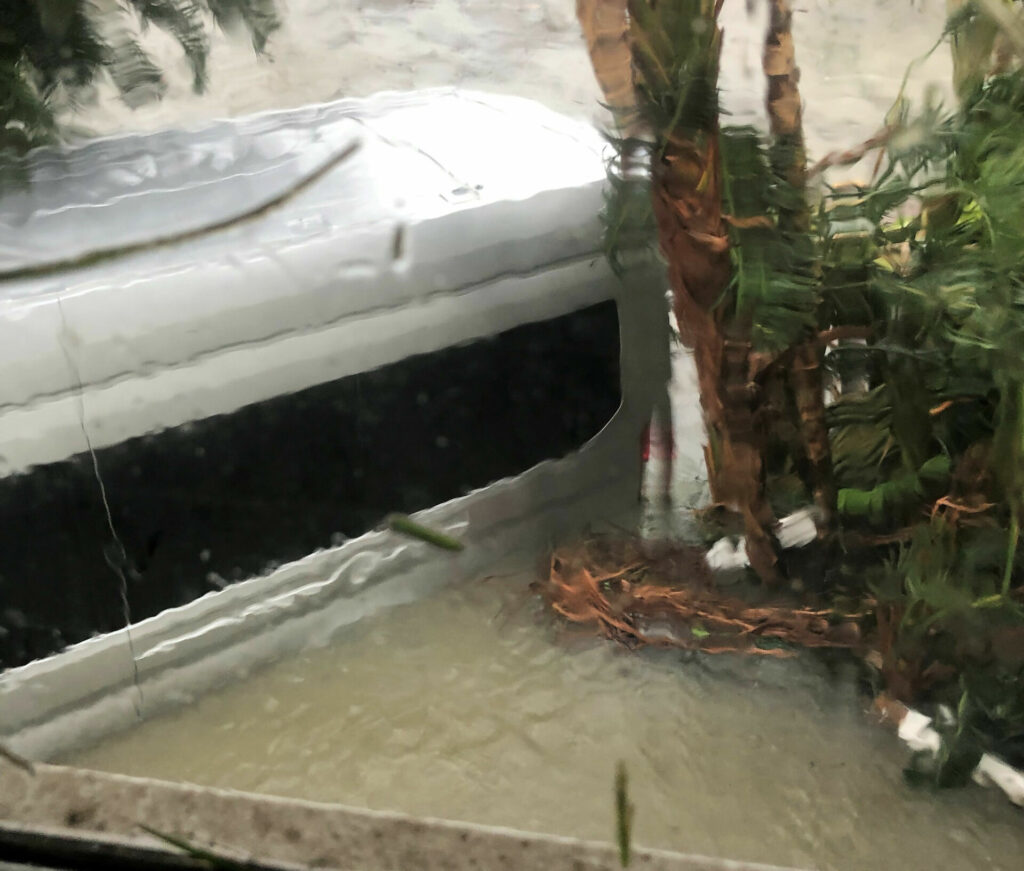 Thomas Stevens' high-roof Ford Transit van after the storm surge started to recede. The water level peaked at the bottom of the windows. Photo courtesy Thomas Stevens.