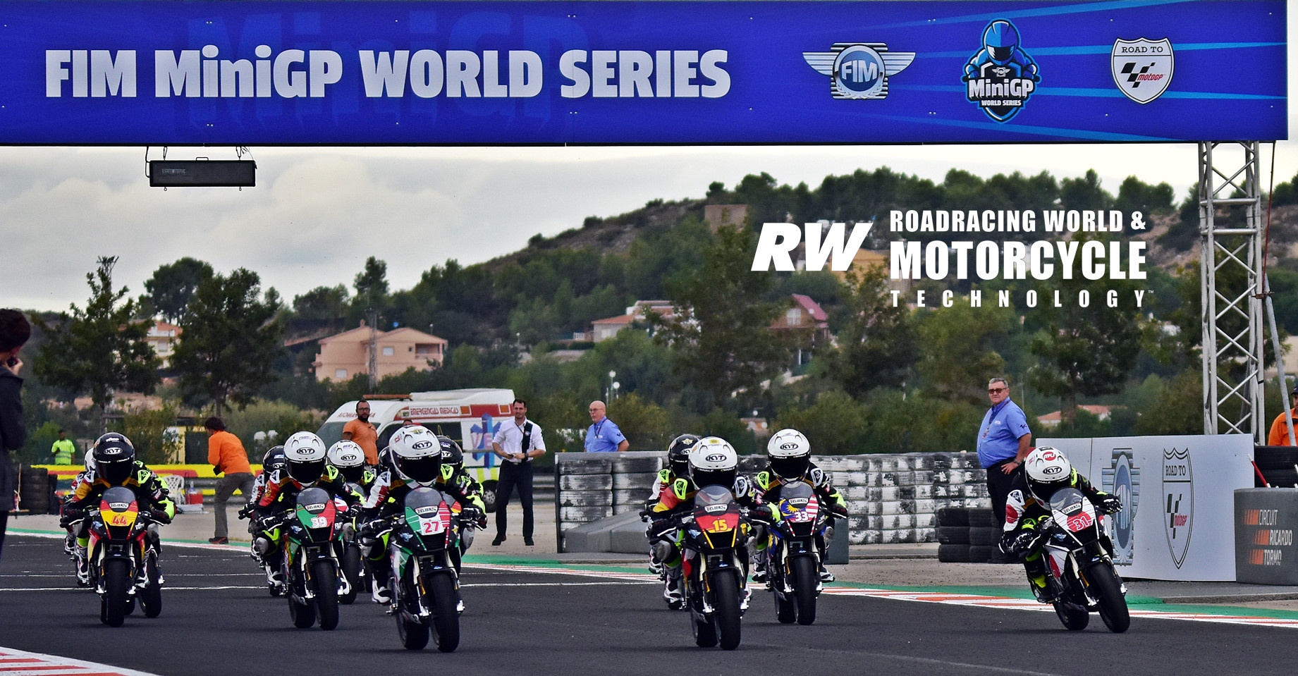 Start of the final race of the FIM MiniGP World Series at Valencia, with winner Gabriel Vuono (27) battling with Fynn Kratochwill (15) and Seiryu Ikegami (31) for the lead into Turn One. Photo by Michael Gougis.