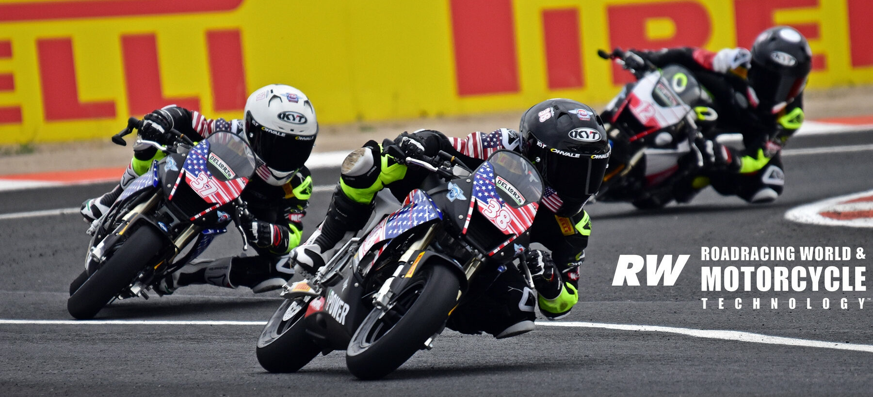American Ryder Davis (38) leads American Nathan Gouker (37) in Race Two at the FIM MiniGP World Series event in Valencia. Photo by Michael Gougis.