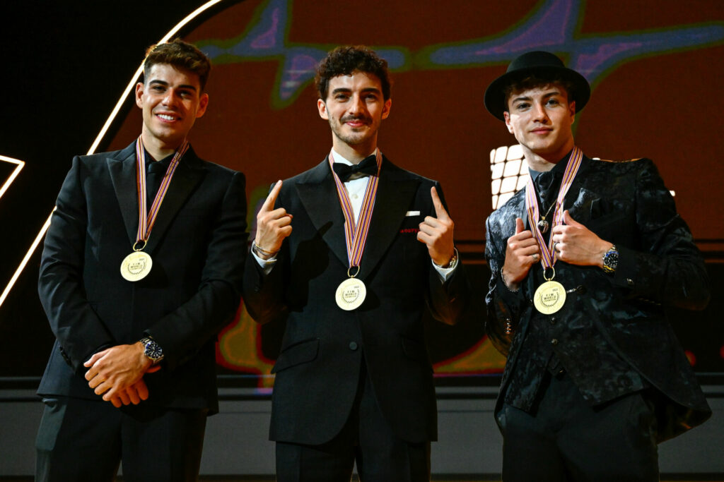 2022 MotoGP World Champion Francesco Bagnaia (center), 2022 Moto2 World Champion Augusto Fernandez (left), and 2022 Moto3 World Champion Izan Guevara (right). Photo courtesy Dorna.