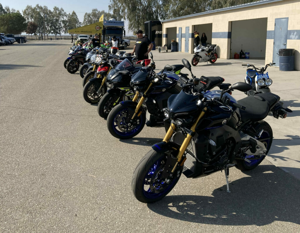 Various motorcycles fitted with Dunlop's new Q5 tires for journalists to use. Photo by John Ulrich.