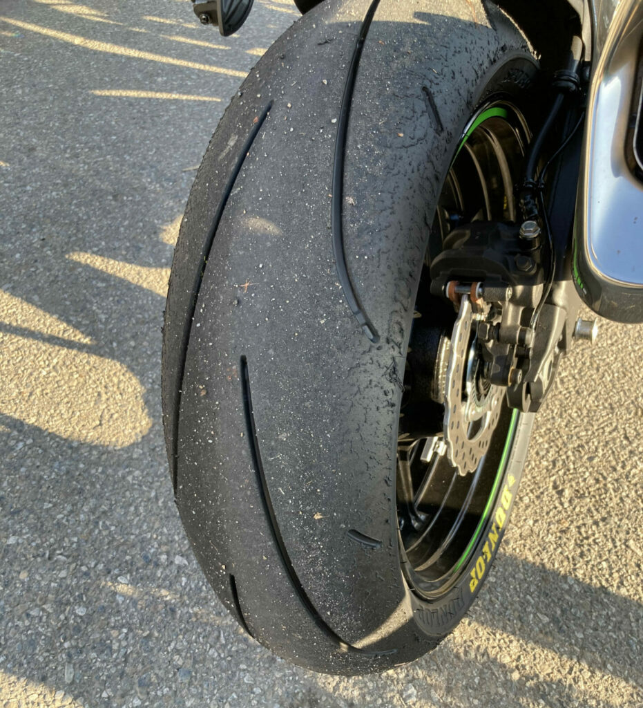 A Dunlop Q5 S rear tire after being on track at Buttonwillow. The S version has additional tread grooves on the shoulders of the tires. Photo by John Ulrich.