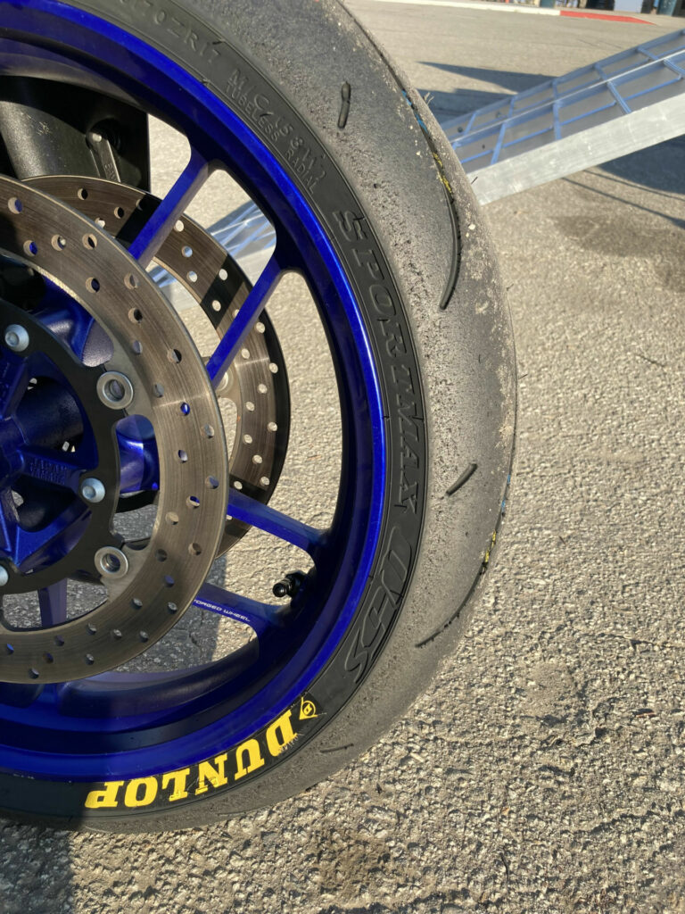 A Dunlop Q5 S front tire after being on track at Buttonwillow. The S version has additional tread grooves on the shoulders of the tires. Photo by John Ulrich.