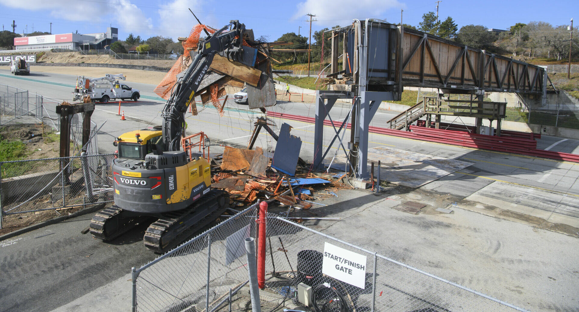 Demolition of the pedestrian bridge over WeatherTech Raceway Laguna Seca's start/finish line has begun. Photo by DMT Imaging, courtesy WeatherTech Raceway Laguna Seca.