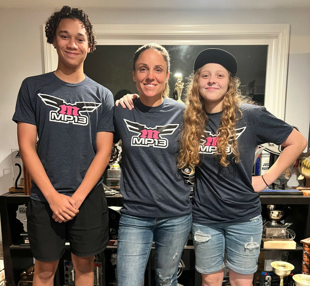 MP13 Racing owner Melissa Paris (center) with Aiden Sneed (left) and Kayla Yaakov (right). Photo courtesy MP13 Racing.