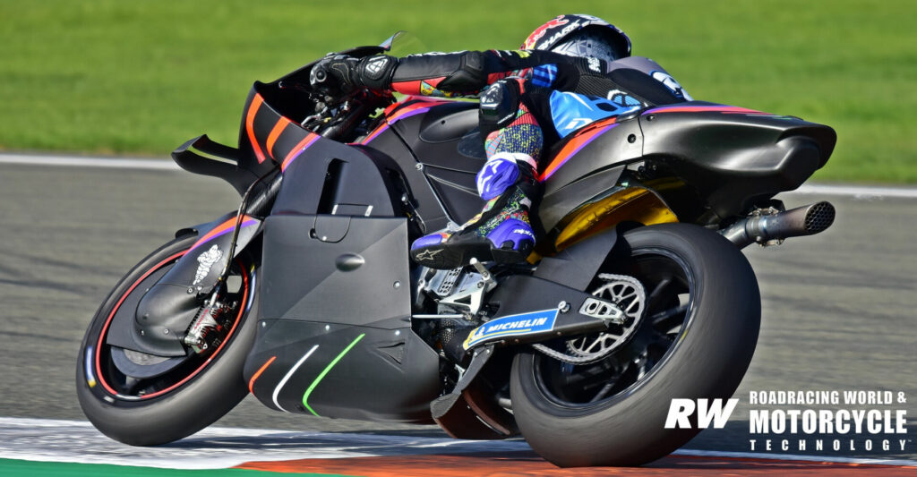 The RNF MotoGP Team Aprilia ridden by new recruit Miguel Oliveira. The bulged fairing lower is thicker, cross-section as seen from the top, at the front and narrower at the rear. When the bike is at full lean, it is essentially an inverted wing form, creating downforce. Photo by Michael Gougis.