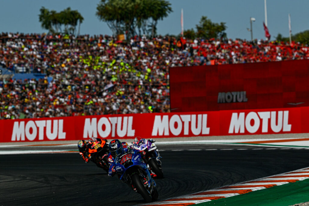 Alex Rins (42) held off Brad Binder (33) and Jorge Martin (89) to finish off the season with a win for Suzuki. Photo courtesy Dorna.