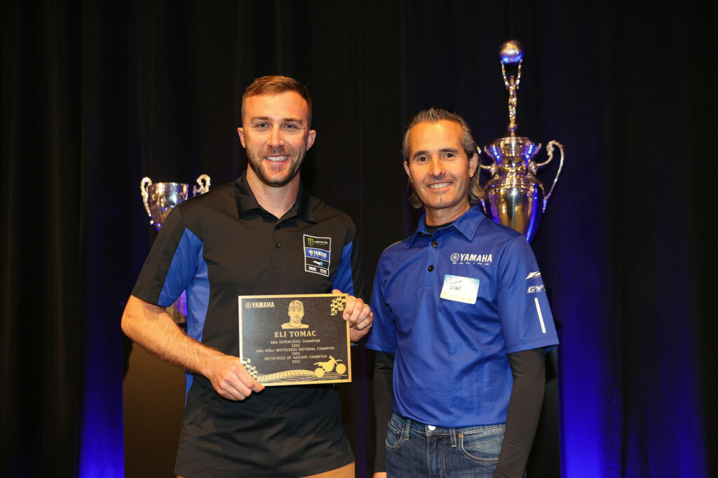 2022 AMA Supercross and 2022 AMA Pro Motocross Champion Eli Tomac (left) with Yamaha Racing Department Manager Jim Roach (right). Photo courtesy Yamaha Motor Corp., U.S.A.