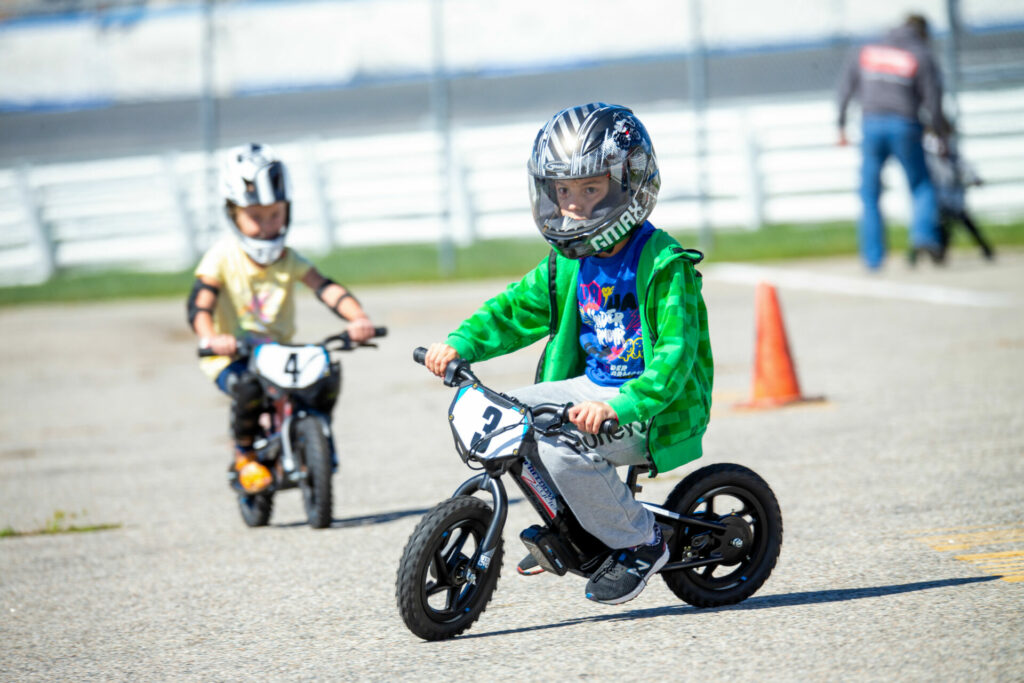 NEMRR provides helmets for children to wear while riding the StaCycs. Photo by Sam Draiss, courtesy NEMRR.