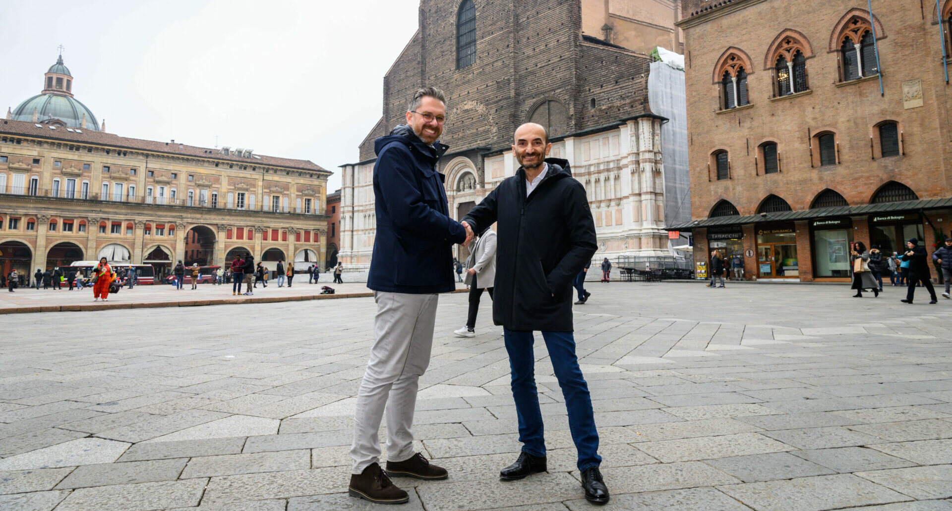 The Mayor of Bologna Matteo Lepore (left) and Ducati CEO Claudio Domenicali (right) in the Piazza Maggiore in Bologna, Italy. Photo courtesy Ducati.