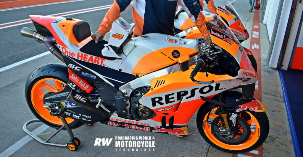 Note the differences between Marc Marquez' RC213V and that of the factory RC213V wheeled out of the garage for Pol Espargaro on Sunday morning for his last ride for HRC. Different wings, no tail stabilizers, different frame, different swingarm and different aero at the fairing lower. Photo by Michael Gougis.