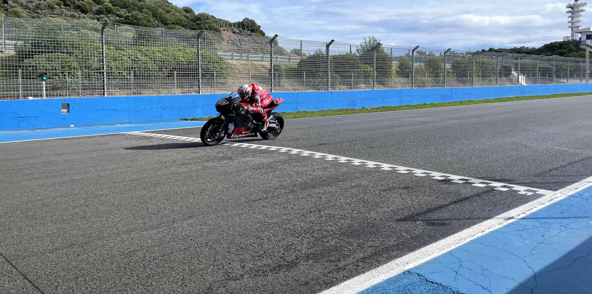 Xavi Vierge (97) at speed on a damp surface at Jerez. Photo courtesy Team HRC.