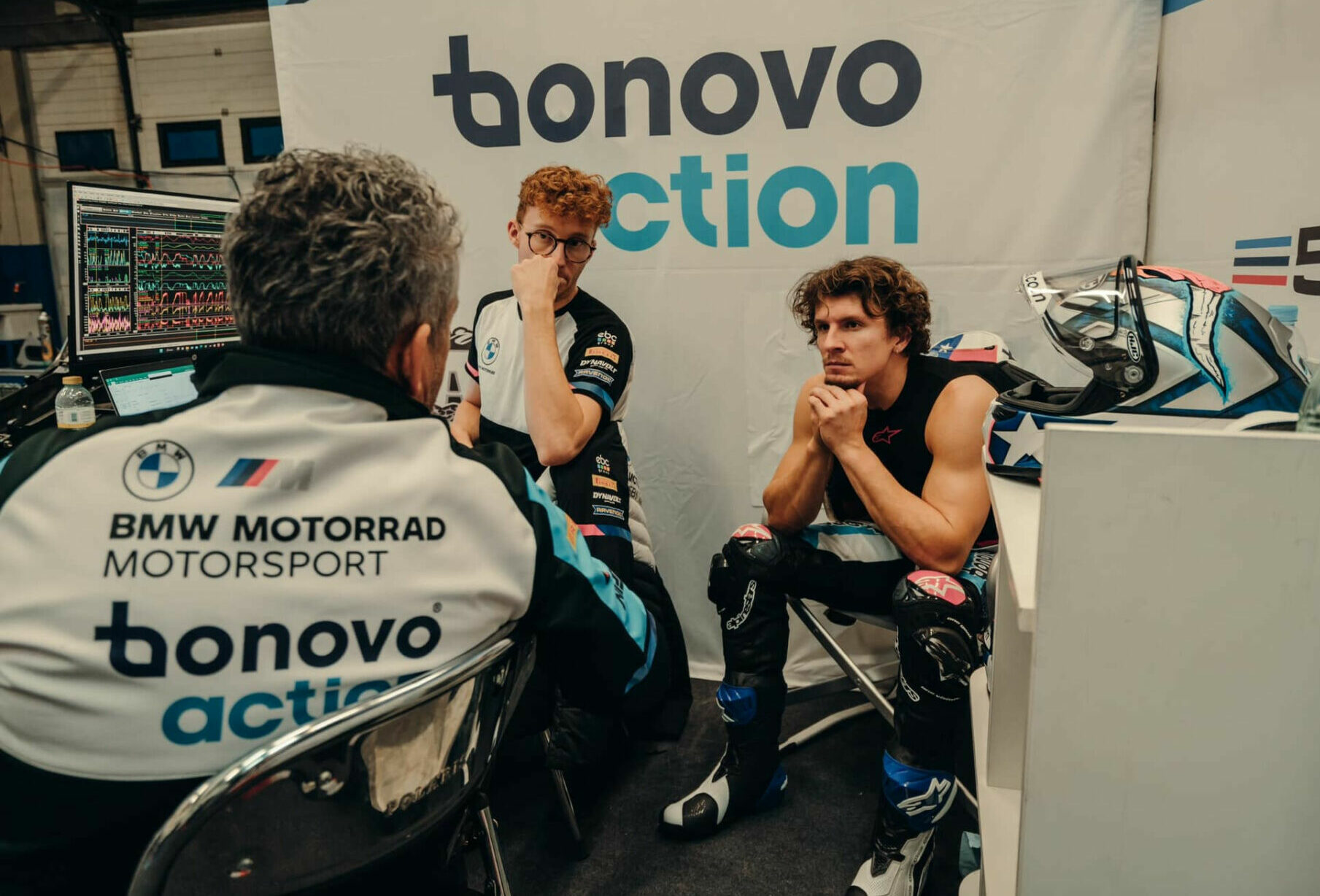 American Garrett Gerloff (right) talks to his Crew Chief Leslie Pearson (left) while Data Technician Andy Leivers (center) listens in. Photo courtesy Garrett Gerloff Racing.