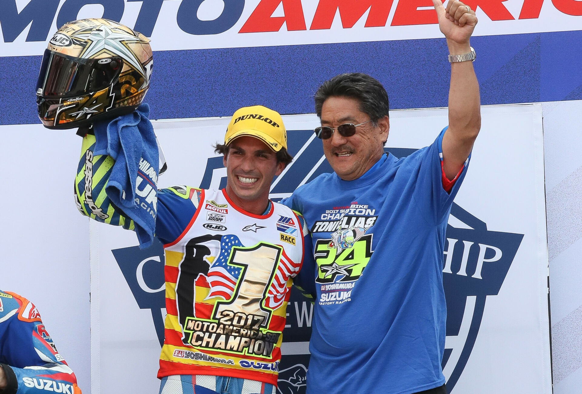 Don Sakakura (right) with Toni Elias (left) at New Jersey Motorsports Park after Elias won the 2017 MotoAmerica Superbike Championship. Photo by Brian J. Nelson.