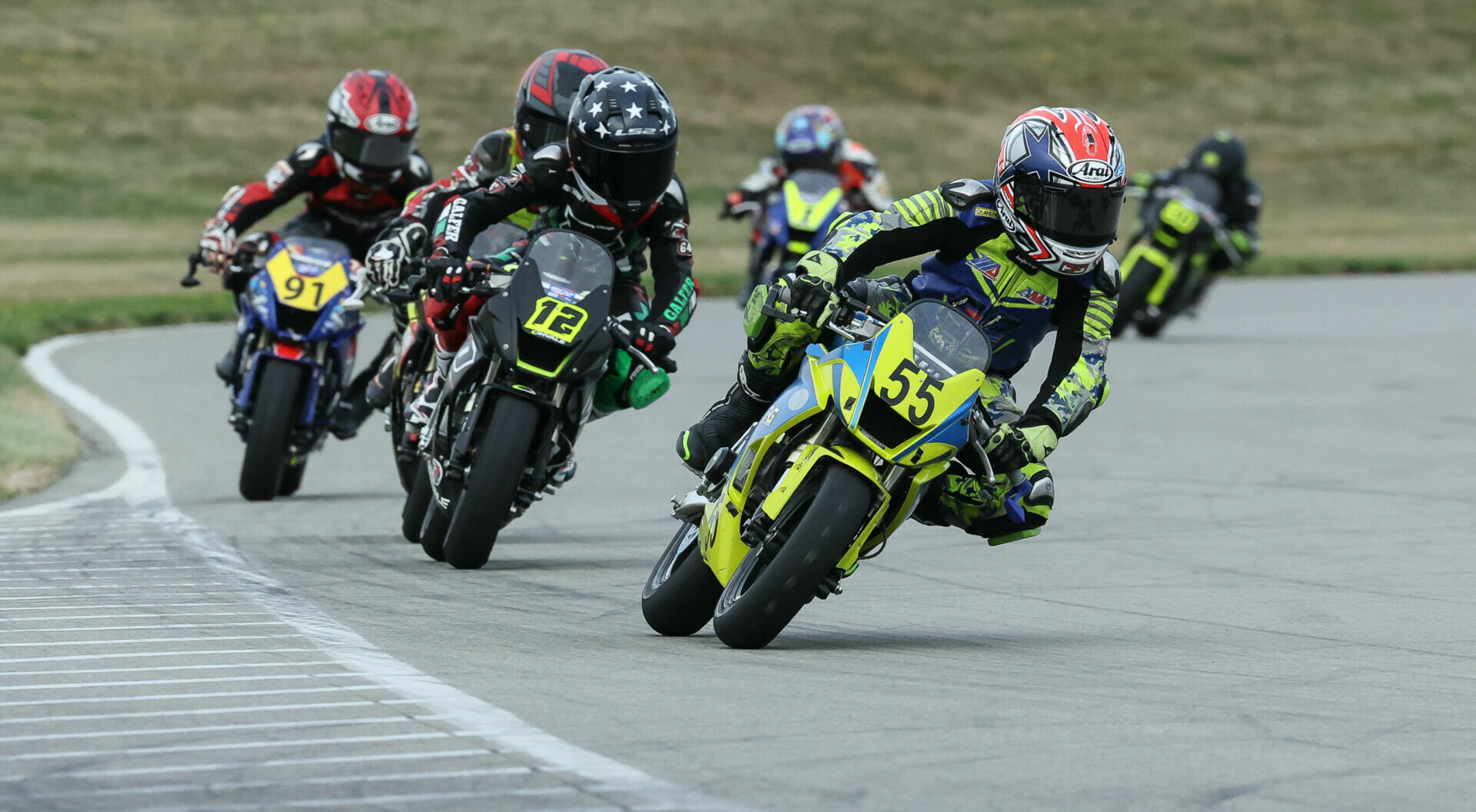 Ryder Davis (55) leads Anthony Lupo, Jr. (12) and the rest of the Mini Cup 160 field during a race at Pittsburgh International Race Complex in 2022. Photo by Brian J. Nelson.