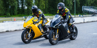 Two Damon electric motorcycle prototypes on a racetrack. Photo courtesy Damon Motors.