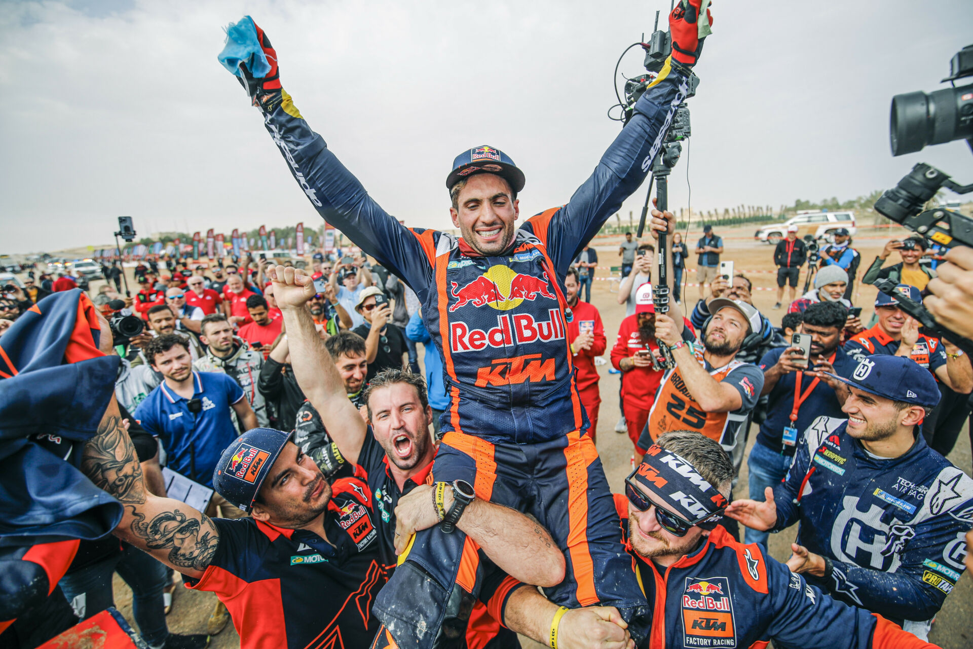 Kevin Benavides and his crew celebrate winning the 2023 Dakar Rally. Photo courtesy KTM Factory Racing.