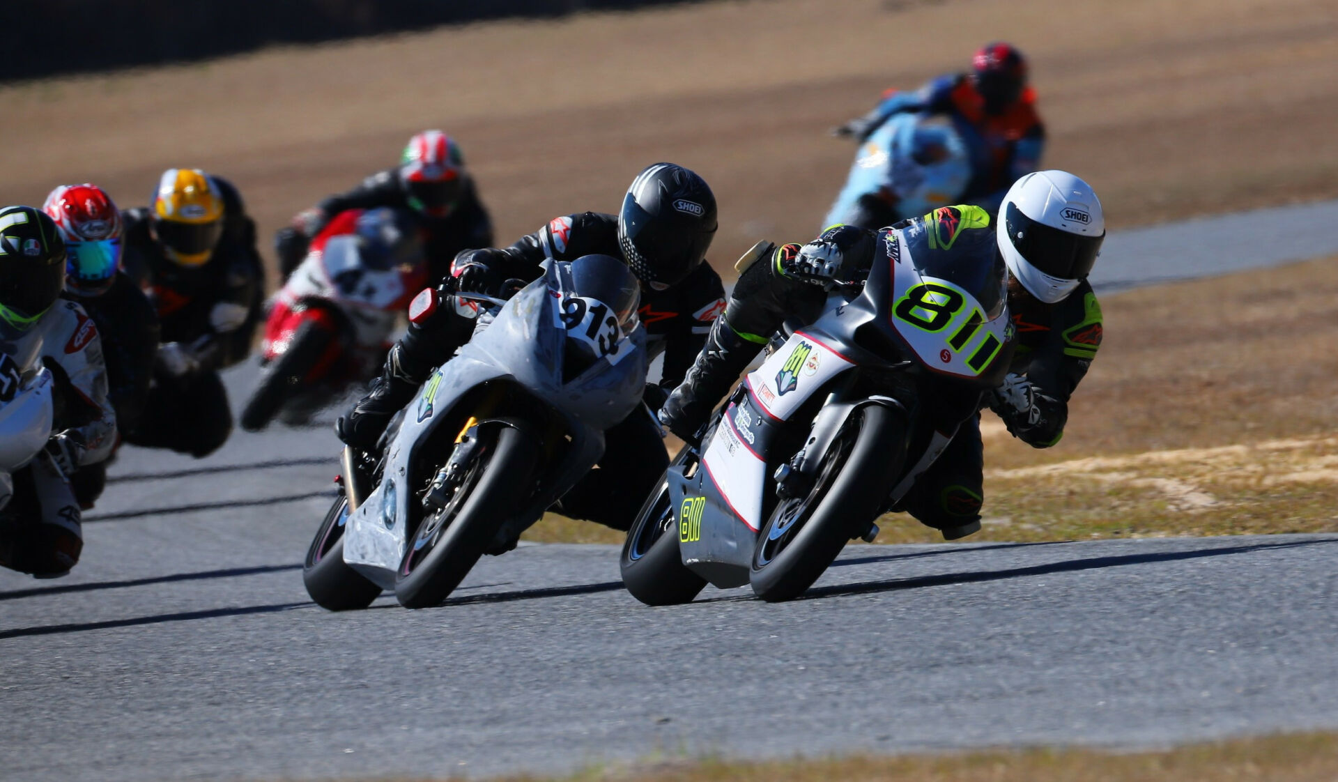 Underground Team Racing riders Tommy Ryan (811) and Arch E. York (913). Photo by etechphoto.com, courtesy AHRMA.