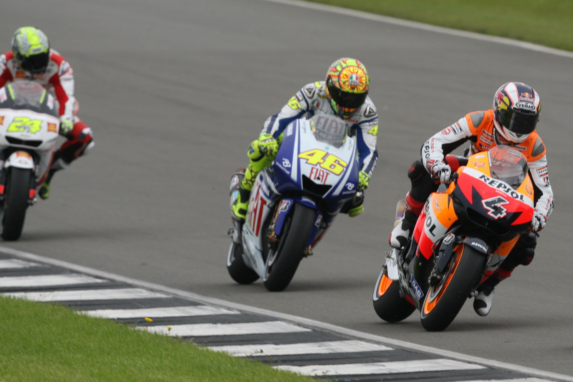 Andrea Dovizioso (4) leading Valentino Rossi (46) and Toni Elias (24) on his way to his first MotoGP victory, at Donington Park in 2009. Photo courtesy Dorna.