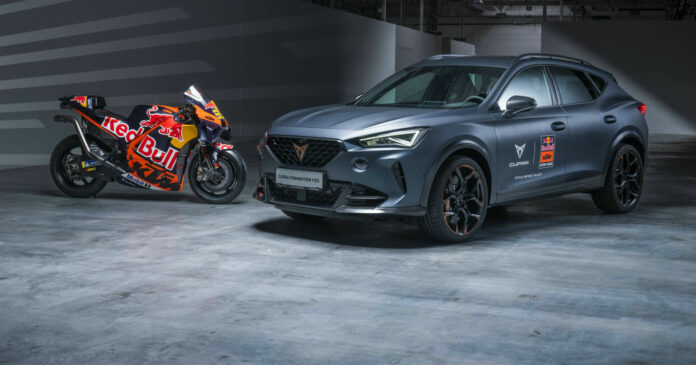 2023 Red Bull KTM MotoGP and CUPRA Brad Binder's Red Bull KTM RC16 MotoGP racebike and a Cupra Formentor VZ5. Photo courtesy KTM Factory Racing.