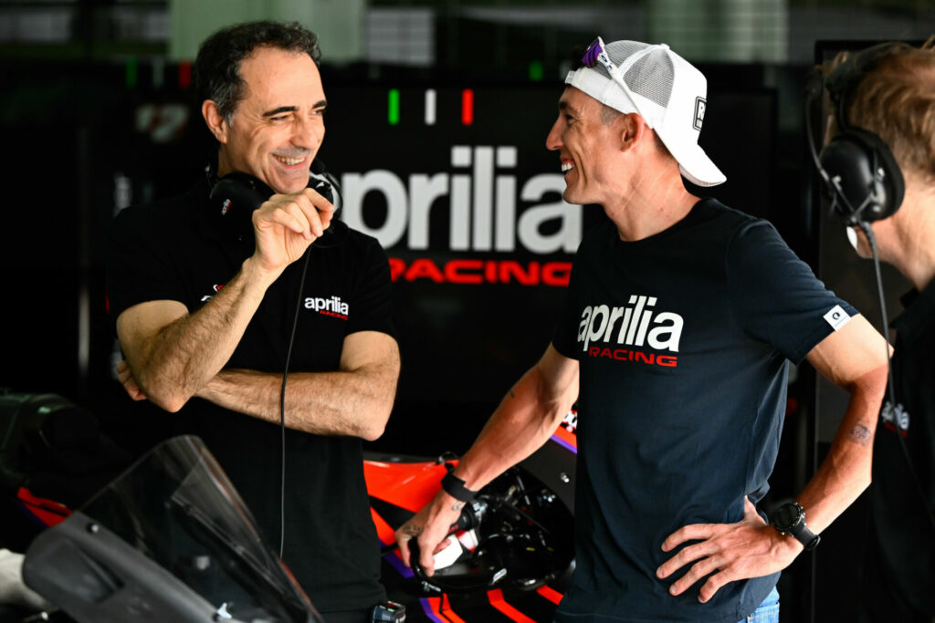Aprilia Technical Director Romano Albesiano (left) with Aleix Espargaro (right) in the garage at Sepang. Photo courtesy Dorna.